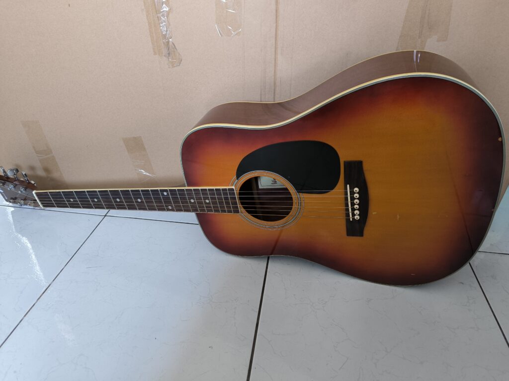 guitar Woodland, Hosco Woodland guitar, Woodland acoustic guitar review, guitar Nhật Bản Woodland, thương hiệu nhạc cụ Hosco, guitar giá rẻ đáng mua,